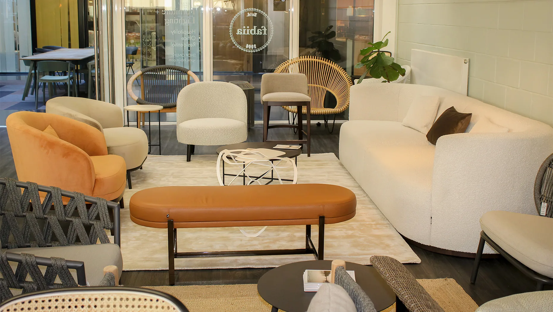 fabiia showroom interiors consisting of plush upholstered armchairs and sofas